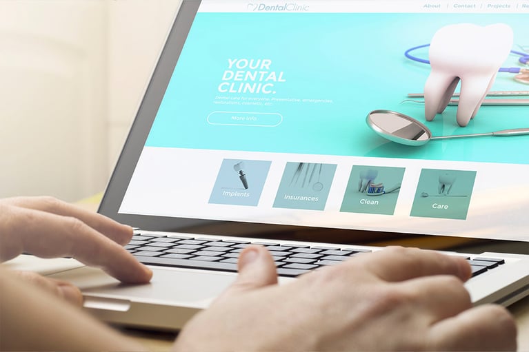 close up of dental website on laptop